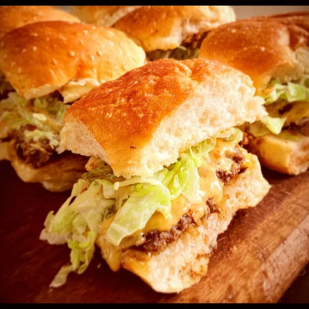 Big Mac Sliders on a platter with fresh ingredients