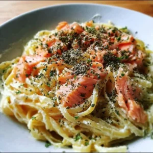 Delicious smoked salmon carbonara dish served in a bowl.