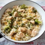 Creamy chicken casserole with broccoli and rice served in a baking dish