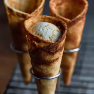 Homemade gluten free ice cream cones ready for scooping ice cream.